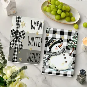 Christmas black and white plaid kitchen tea towel set with cute snowman and festive text.