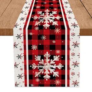 Christmas buffalo plaid table runner with white snowflake pattern for holiday party decor detail view
