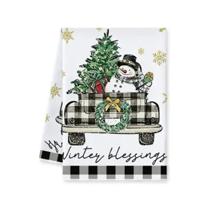 Christmas black and white plaid kitchen towel with cute snowman and tree print, holiday home decor.