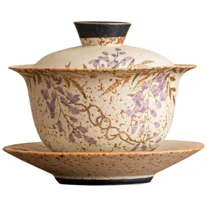 Tasse à thé Gaiwan en céramique peinte à la main glycine, design traditionnel doré.