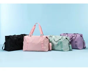 Large capacity travel duffel bag for women, lightweight waterproof weekender carry-on bag.