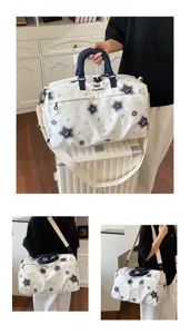 Large capacity travel duffel bag with separate shoe compartment and stylish star pattern design.