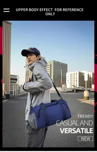 Large capacity blue sports duffel bag detail showing shoulder strap and side mesh pocket design.