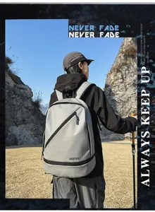 Outdoor detail view of the grey waterproof sports backpack with a stylish modern design.