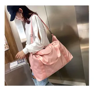 Large capacity pink travel duffel bag lightweight portable luggage shoulder bag for women
