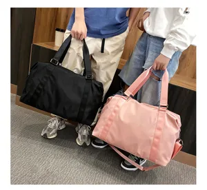Detail view of large capacity travel duffel bag with handles and straps for business trips.