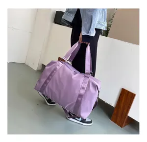 Large capacity travel duffel bag lightweight portable luggage bag for short trips and flights.