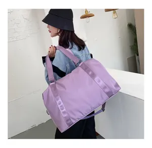 Large capacity lightweight travel duffel bag for women, perfect for short trips and business.