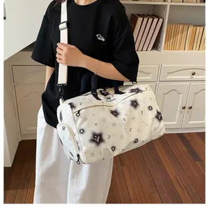 Detailed lifestyle shot of the versatile travel duffel bag showcasing its stylish star pattern.