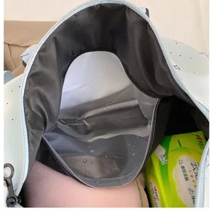 Interior detail of large capacity casual travel gym bag with waterproof wet dry separation compartment.