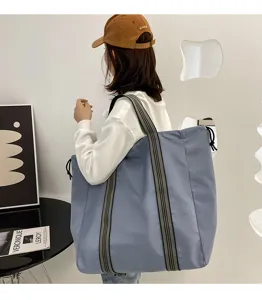 Large capacity oxford cloth travel bag, multi-functional shoulder and tote luggage.