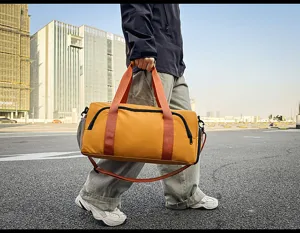 Large capacity travel duffle bag with separate shoe compartment for gym and sports use.