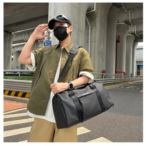 Large capacity gym duffel bag for sports, travel, and fitness with dry wet separation design.