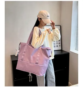 Large capacity purple travel fitness bag with wet dry separation and expansion design.