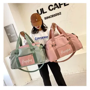 Sac de sport multifonctionnel bloc de couleur avec compartiment chaussures étanche.