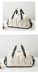 Large capacity travel duffel bag for women, casual canvas fitness shoulder bag with pockets.