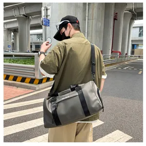 Detailed look at the grey dry-wet separation sports duffel bag designed for gym and travel.