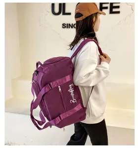 Sac à dos de sport violet multifonctionnel pour femmes, idéal pour le fitness et les voyages.