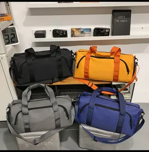 Large capacity travel duffel bag sports gym bag with shoe compartment and shoulder strap.