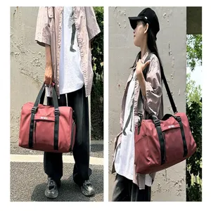 Large capacity fitness duffel bag with dry wet separation for sports and short travel.