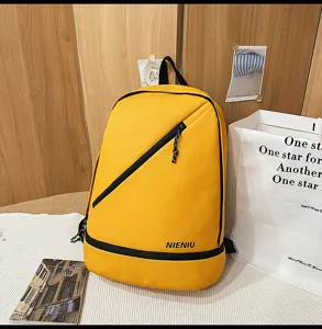 Yellow waterproof sports backpack with dry wet separation shoe compartment and diagonal zipper.