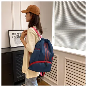 Blue oxford cloth drawstring backpack with red stripes and double zipper pockets for daily sports.