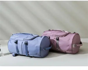 Grande borsa da viaggio multifunzionale e zaino in blu e viola per donne e tempo libero.