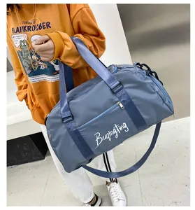 Sac de sport de fitness polyvalent colorblock avec compartiment à chaussures et séparation.