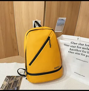 Yellow waterproof leather fabric casual backpack with diagonal zipper and shoe compartment.