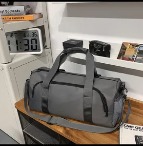 Large capacity travel duffel bag with separate shoe compartment for gym and sports fitness.