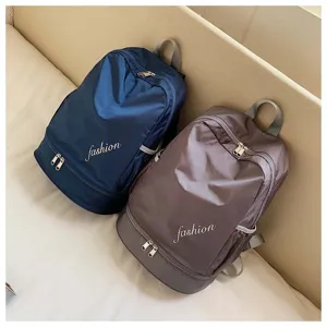 Oxford cloth sports casual backpack with dual zipper compartments and large capacity design.