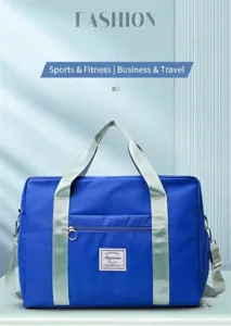 Detailed view of the large capacity travel bag featuring durable blue fabric and sturdy handles.