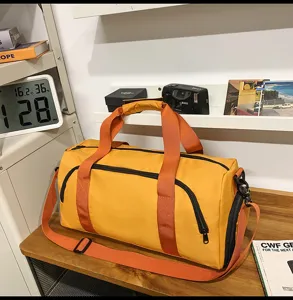 Large capacity sports duffel bag, durable travel gym bag with shoulder strap and shoe pocket.