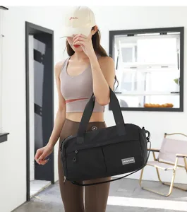 Lightweight nylon gym bag for women, large capacity travel duffel bag with sturdy handles.