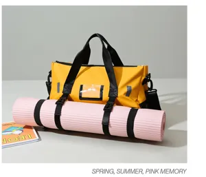 Waterproof fitness duffel bag detail showcasing yoga mat strap and durable yellow fabric.