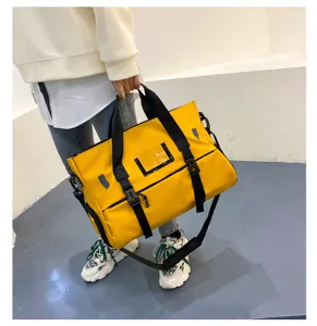 Waterproof fitness gym bag with separate shoe compartment, large capacity yellow travel duffel.