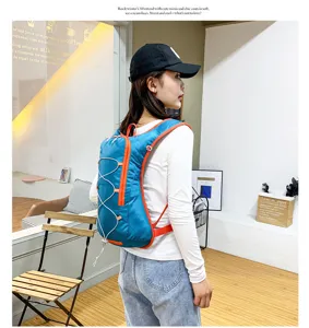 Outdoor cycling backpack hiking daypack with bungee cords for sports and travel use.