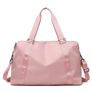 Pink travel duffel bag for women large capacity lightweight waterproof weekend overnight bag.