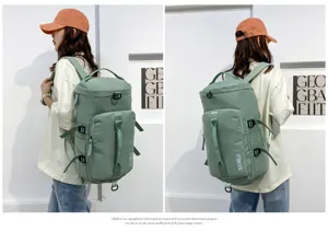 Zaino da viaggio cilindrico multifunzionale, grande capacità borsa scolastica casual.