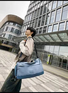 Large capacity travel duffel bag for sports, fitness and business trips with wet dry separation.