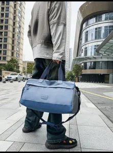 Large capacity travel duffel bag with dry wet separation, stylish shoulder bag for gym.