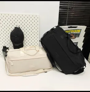 Large capacity travel duffel bag with wet dry separation for sports, fitness and gym use.