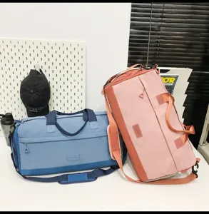 Large capacity travel duffel bag with wet dry separation for fitness and sports.