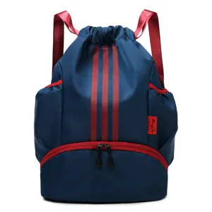 Blue drawstring sports backpack with red straps, large capacity gym bag for training.