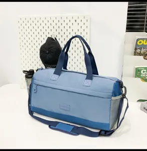 Blue large capacity travel duffel bag for sports gym fitness lightweight storage options.