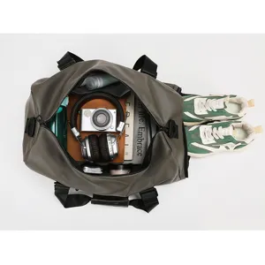 Large capacity duffel gym bag with dry wet separation for sports, travel, and fitness training.