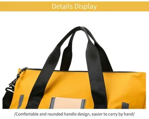 Close-up view of durable waterproof fitness duffel bag handle, black webbing details.