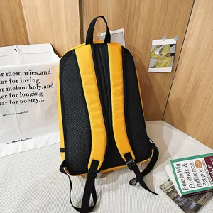 Casual yellow and black backpack with breathable mesh straps and durable everyday design.