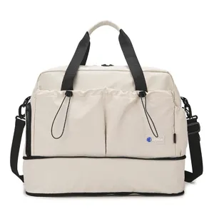 Beige travel duffel bag with shoulder strap and large capacity for gym and yoga.
