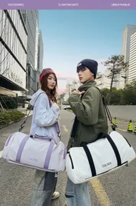Details of the fashion color-blocking sports gym duffel bag with large capacity for travel.